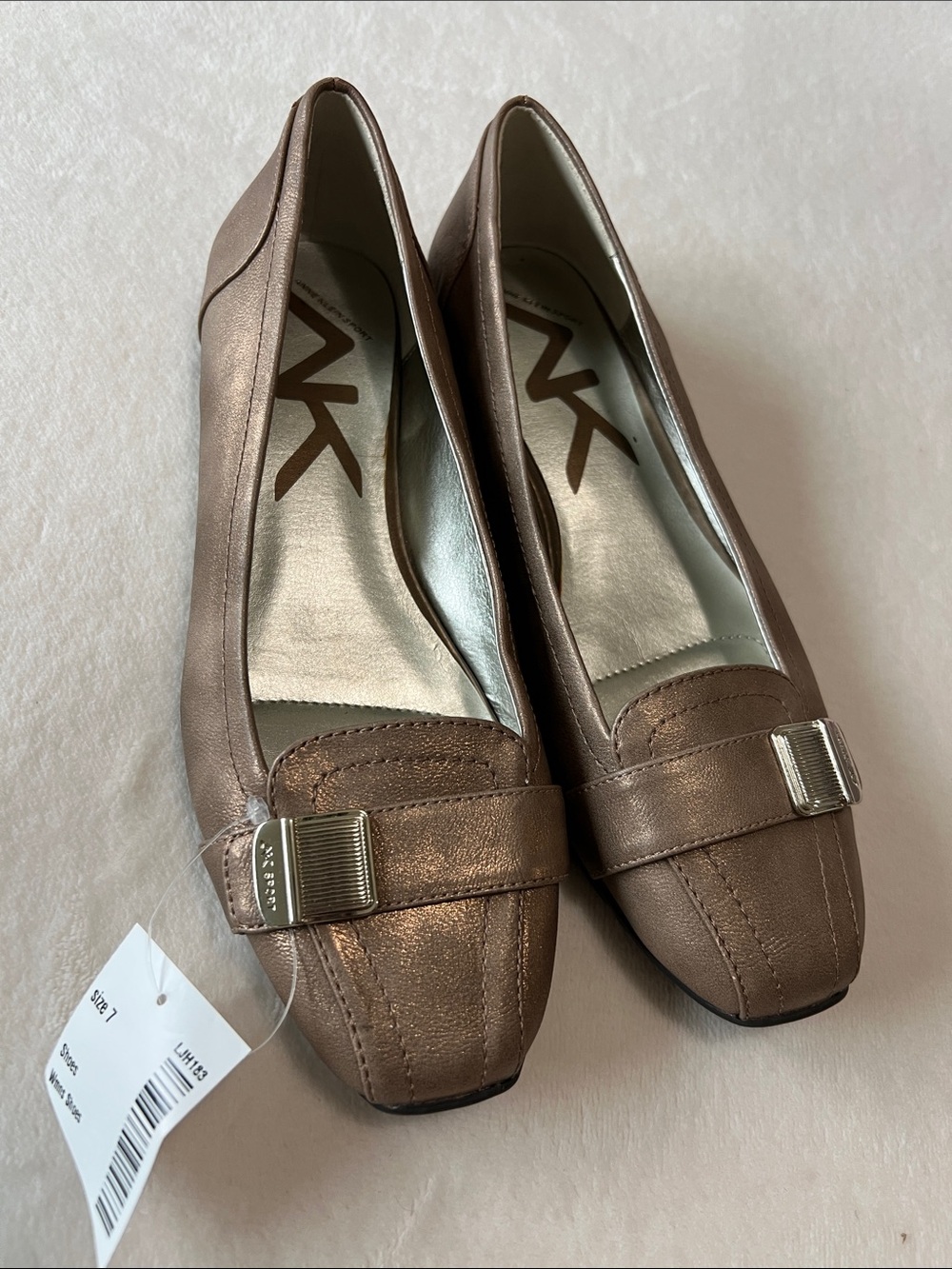 Anne Klein Metallic Bronze Slip-On Loafers with Buckle Accent